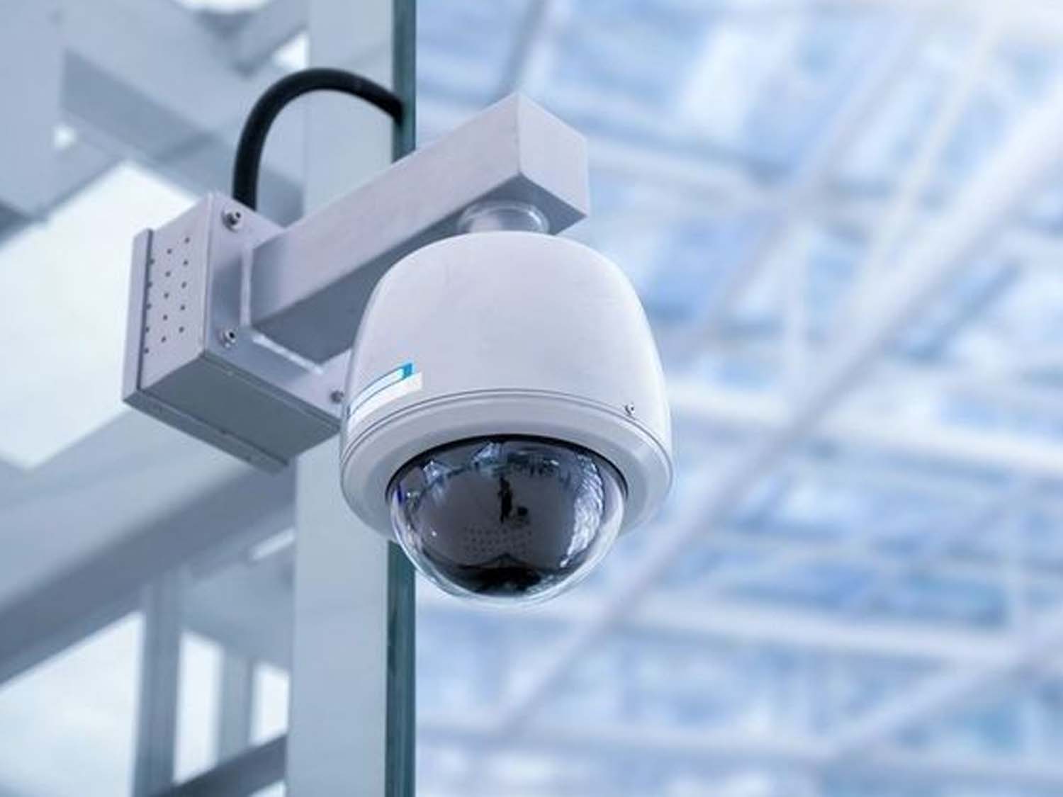 Dome security camera mounted on a commercial ceiling