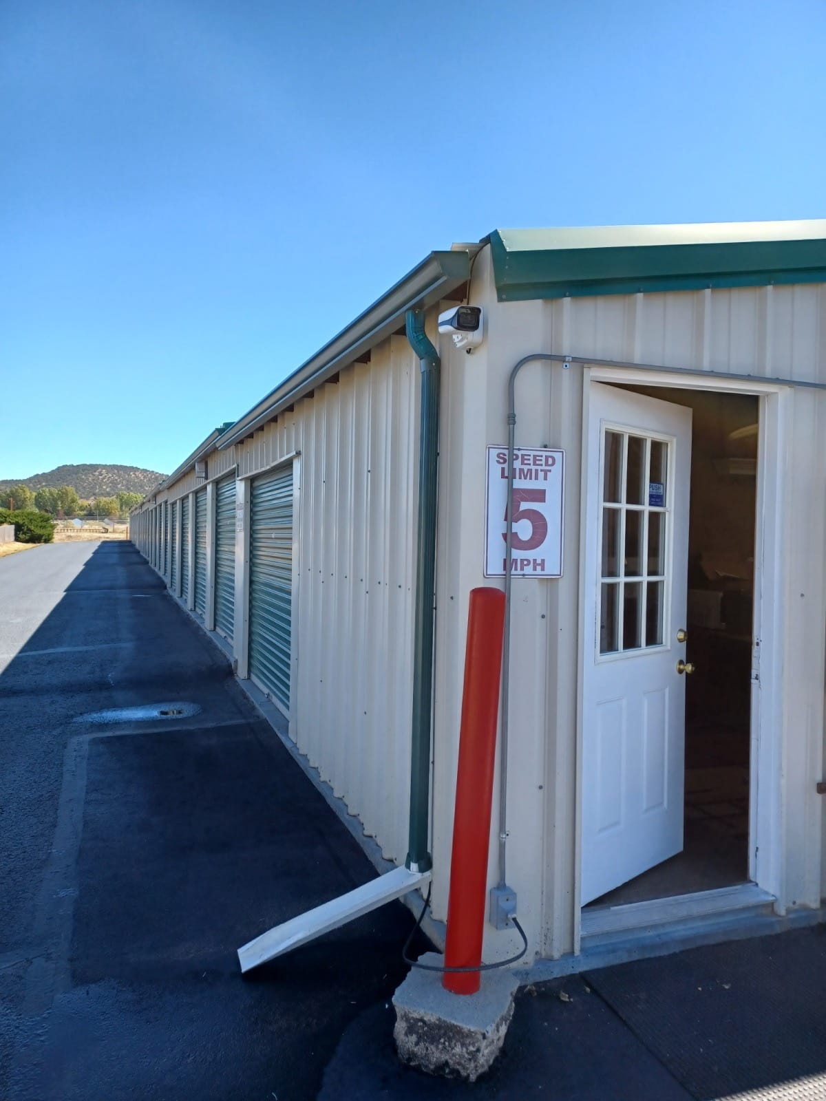 AI-powered bullet camera installation at Airpark Self Storage
