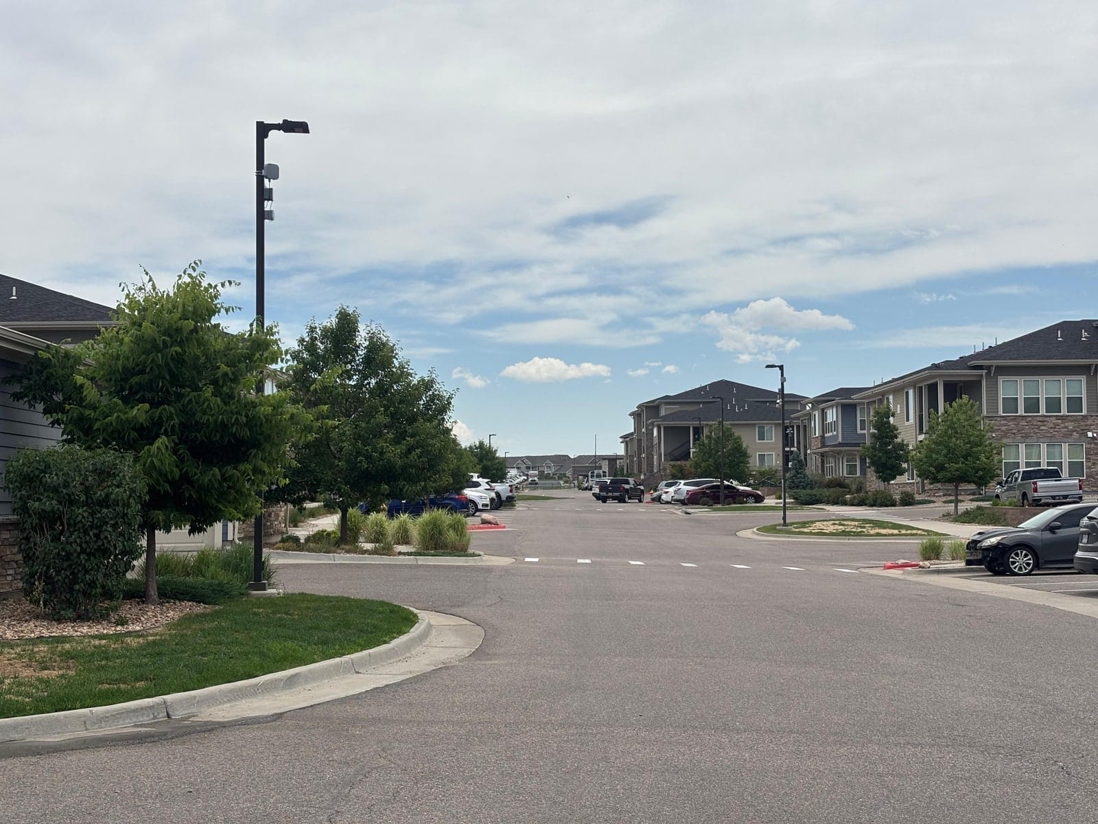 Apartment buildings and resident parking at The Argonne in Denver