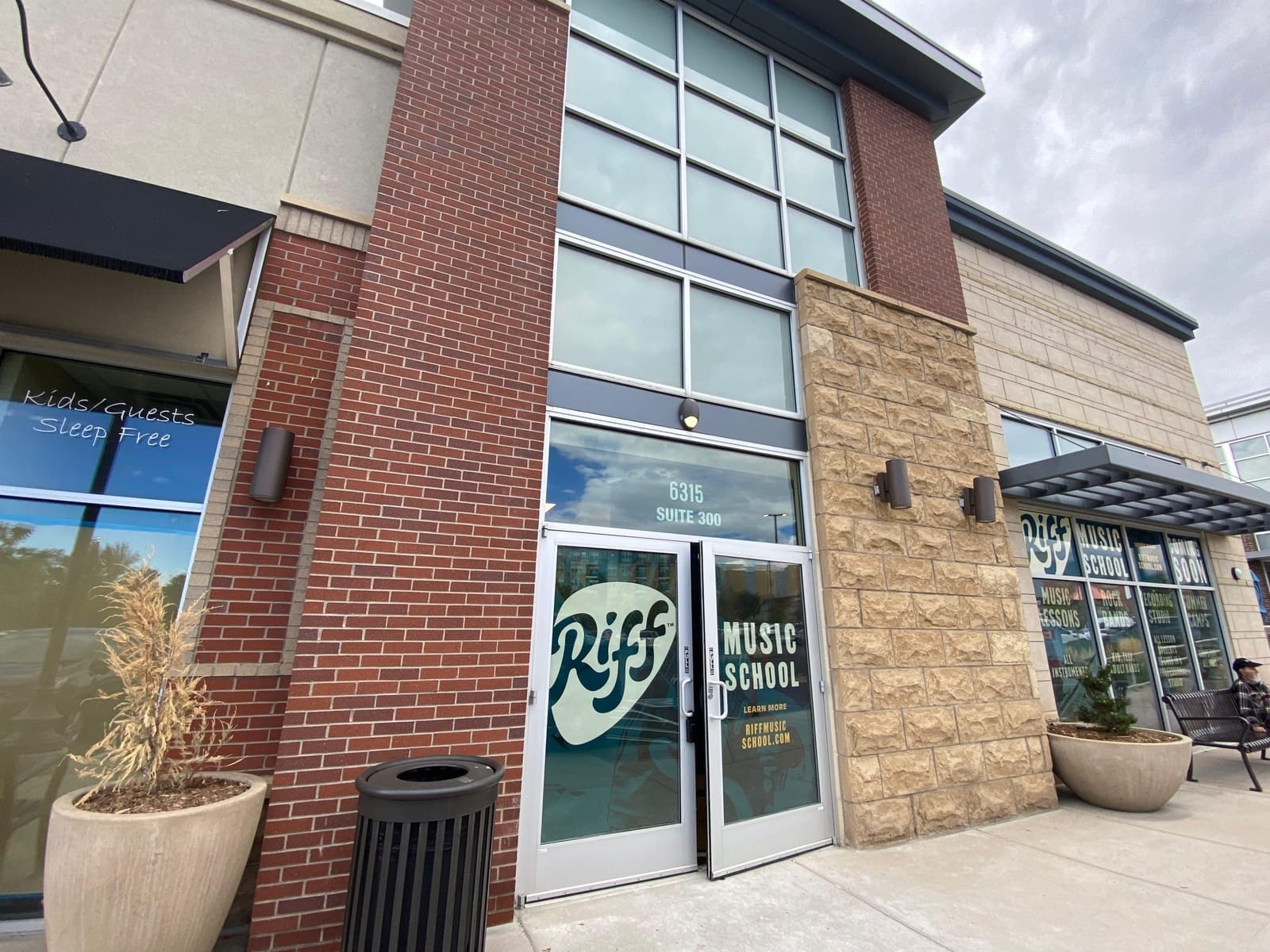 Integrated access control system for employee entry at Riff Music